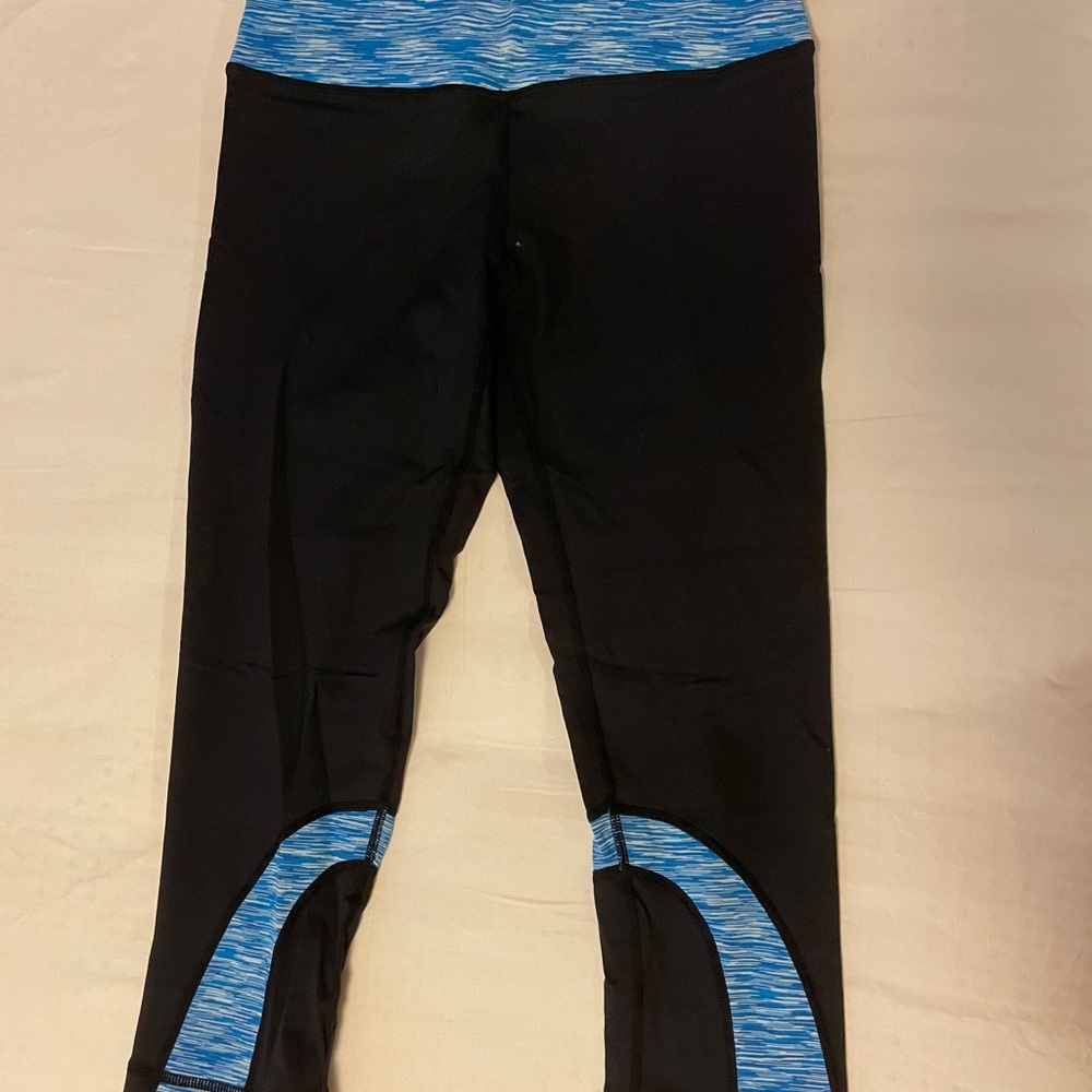 Black and blue athletic capris